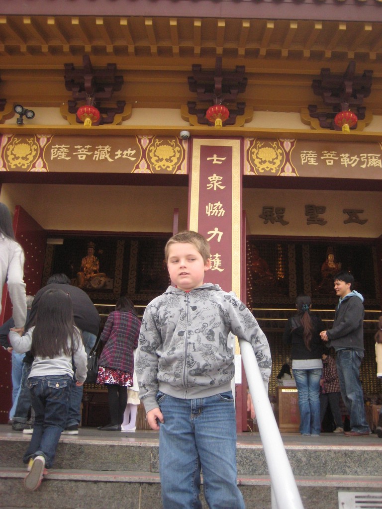 On the steps of temple. 